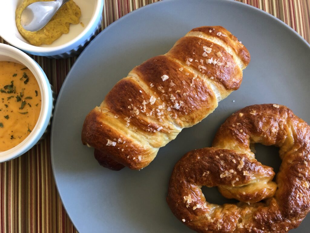 pretzel dog soft pretzel cheese sauce mustard